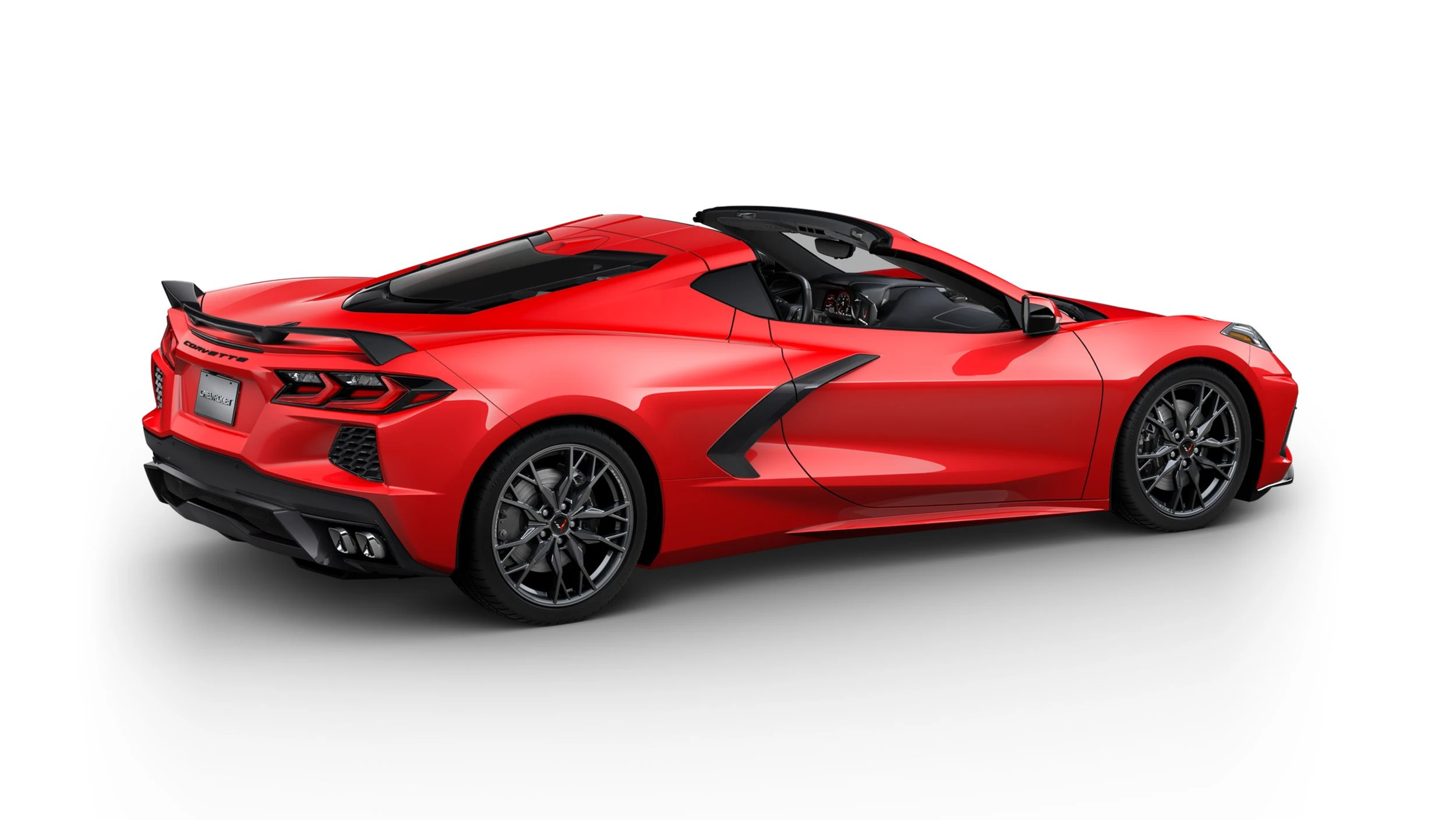 Three-quarter rear view of a 2024 C8 Corvette Stingray in Red Torch