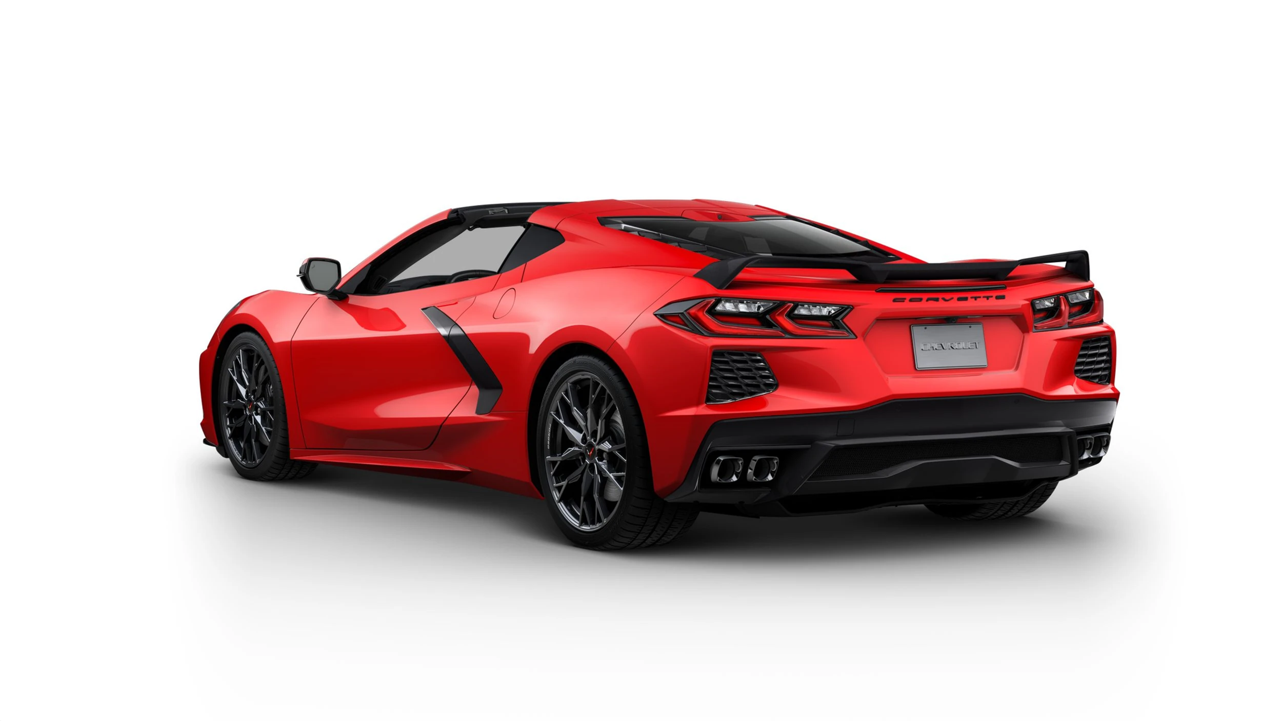 Three-quarter rear view of a 2024 C8 Corvette Stingray in Red Torch