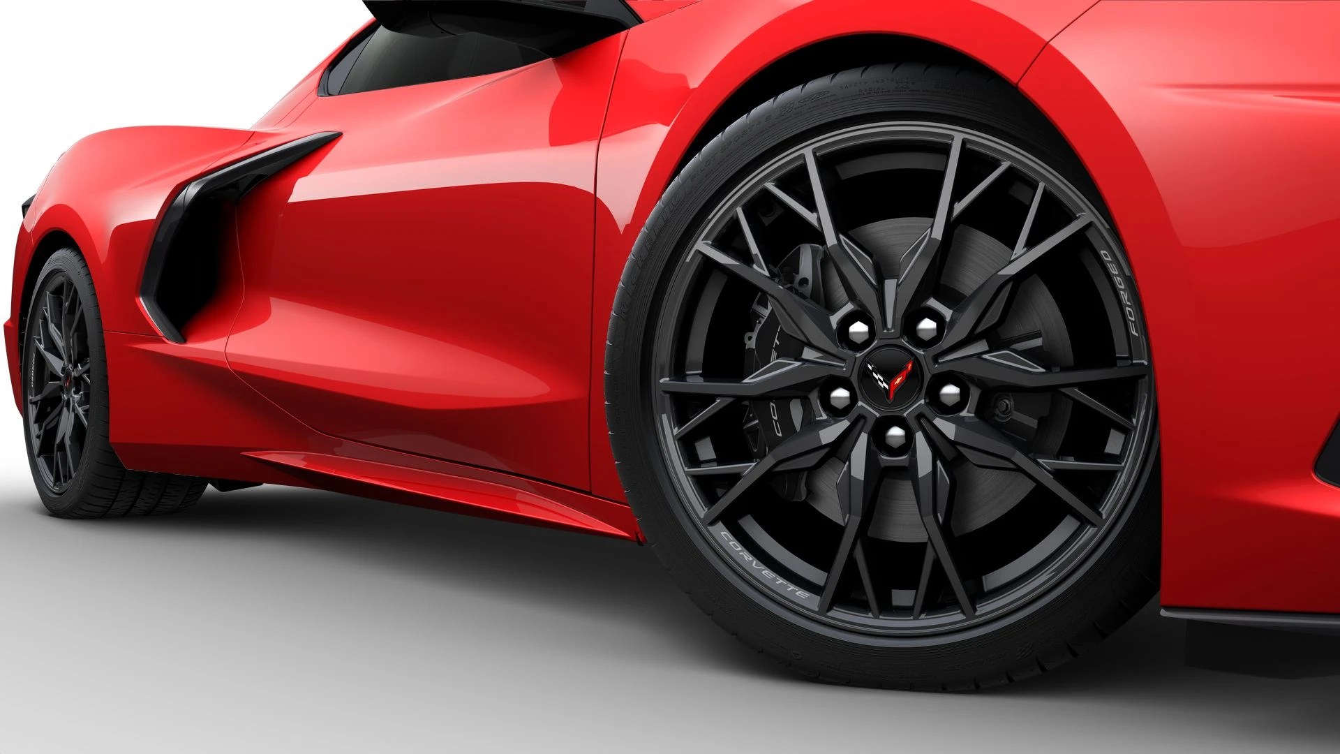 Front right wheel of a 2024 Corvette C8 Stingray in Torch Red