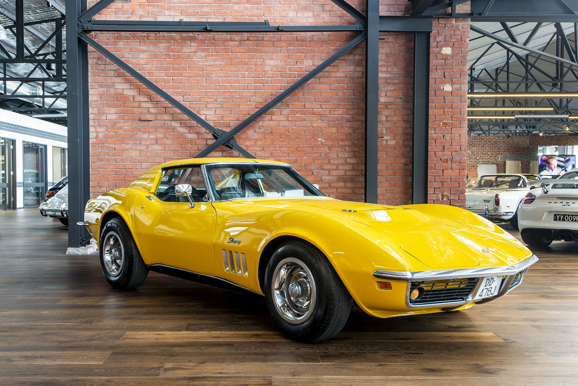 Image showing a side-angled profile of a Chevrolet C3 Corvette Stingray.