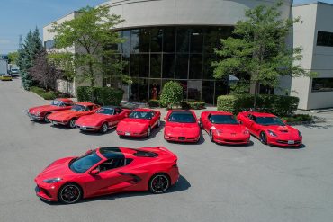 Image showing all the Corvette generation models painted in red.