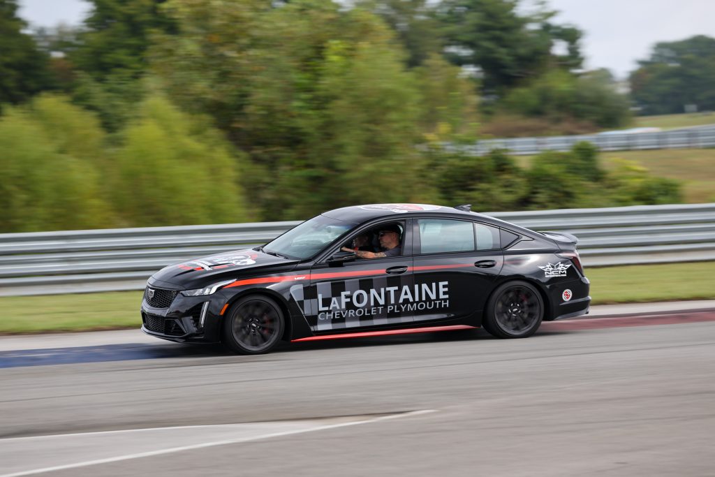 The Cadillac Blackwing was a lot of fun to experience on the racetrack - we can't recommend the experience enough, and we encourage you to contact the NCM Motorsports Park today to book your experience in this awesome car.  Despite experiencing some understeering and body roll, the Cadillac Blackwing is an incredibly capable "track car", which is all the more impressive given the level of comfort built into this car Preparing to take the 2024 Cadillac CT5-V Blackwing out on the NCM Motorsport Park racetrack for tour laps. (Image courtesy of Cole Carroll/NCM Motorsports Park.)